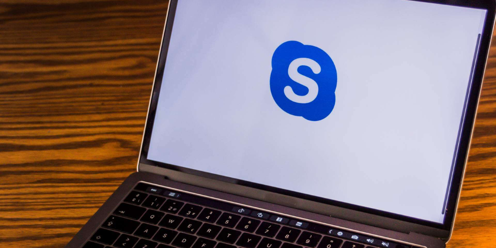 Skype logo at laptop